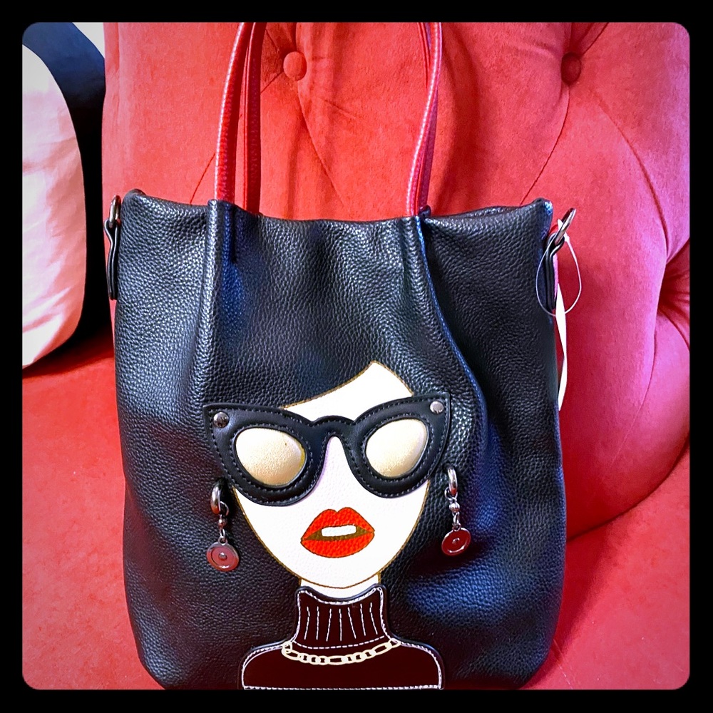 Faux leather handbag with embellishments
